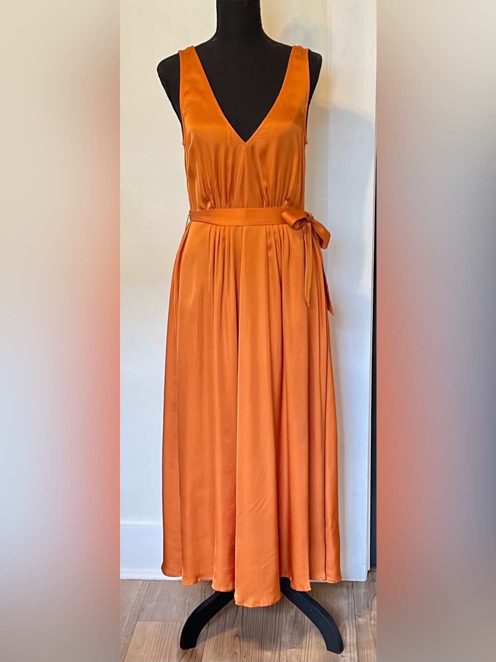 FRNCH Paris burnt orange maxi dress, known for its vibrant hue and sophisticated